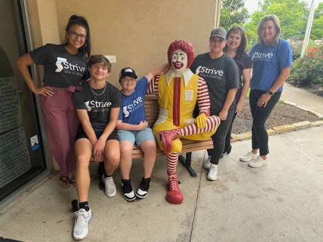 Strive employees and Children at the Ronald McDonald House