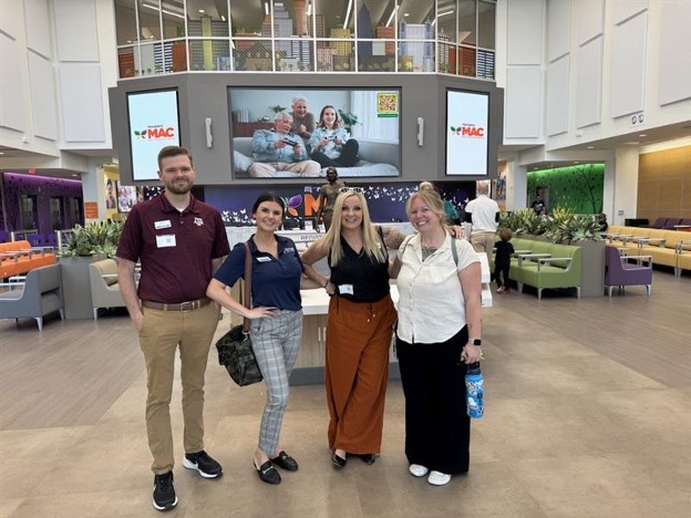 Strive employees together at an event