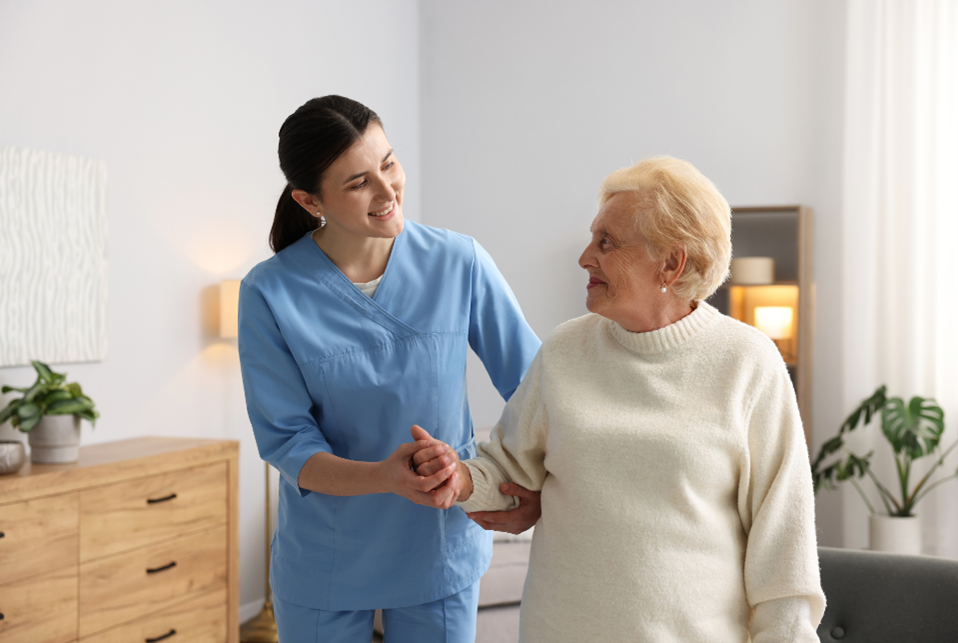 Companion Care Aide assisting elderly patient